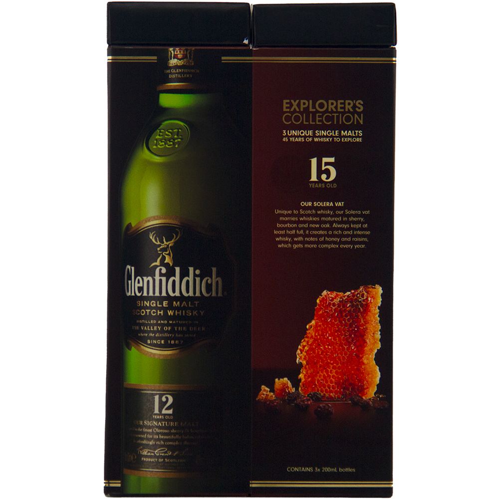 A dark box displays Glenfiddich Explorers Collection Single Malt Scotch Whisky 200ml, showing a bottle image on the left and details about 15-year-old Speyside whisky on the right, next to an amber crystal.