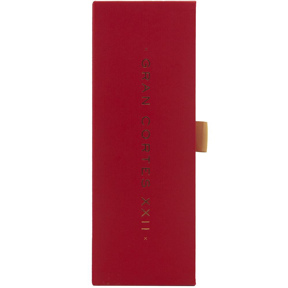 A tall, rectangular red box with gold text reading Glenfiddich Gran Cortes XXII Single Malt Scotch Whisky, a 22 Year Old finished in Palo Cortado casks, displayed vertically in the center with a gold tab on the right.