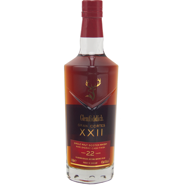 A bottle of Glenfiddich Gran Cortes XXII Single Malt Scotch Whisky, a 22 Year Old expression finished in rare Palo Cortado sherry casks, featuring a gold stag logo and a red label with gold lettering.