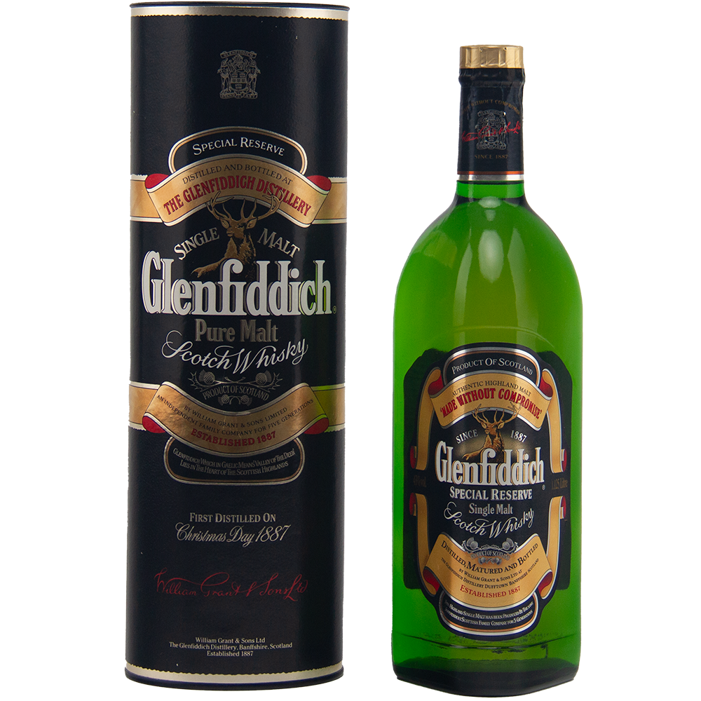 A green bottle of Glenfiddich Pure Malt Whisky Single Malt Scotch Whisky 1125ml stands beside its black cylindrical box, both with gold, red, and cream labels—a striking vintage collectible for whisky enthusiasts seeking a large-format bottle.