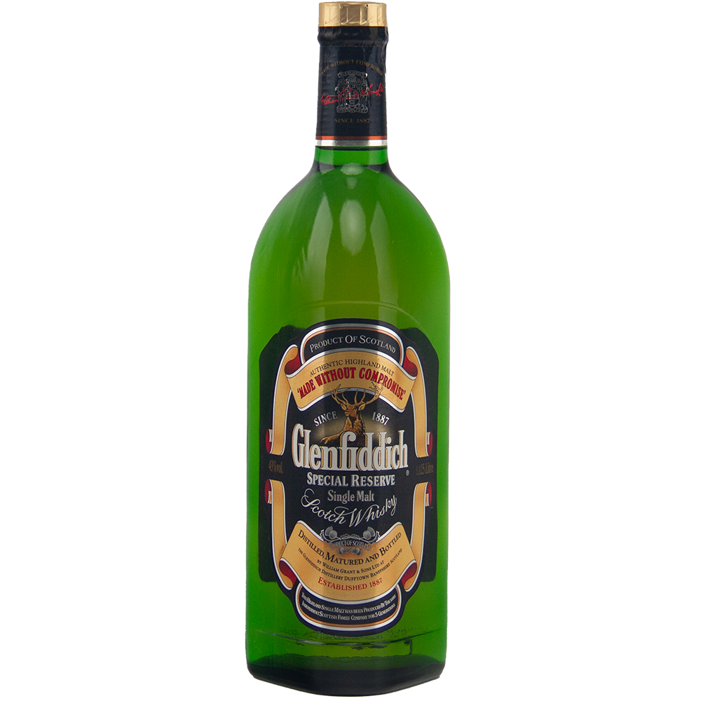 A vintage collectible 1125ml green bottle of Glenfiddich Pure Malt Whisky Single Malt Scotch Whisky with a gold and black label and gold foil seal on the cap.