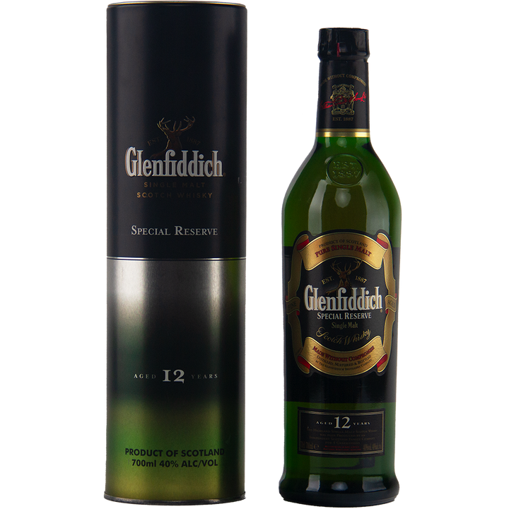 A bottle of Glenfiddich 12 Year Old Special Reserve Single Malt Scotch Whisky stands beside its matching green and black cylindrical packaging, both featuring the brand's logo and details, reflecting Glenfiddich’s classic appeal.