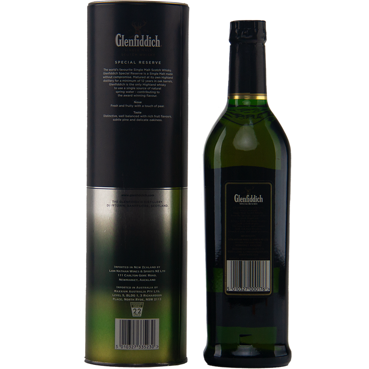 A Glenfiddich 12 Year Old Special Reserve Single Malt Scotch Whisky bottle stands beside its black and green packaging tube, both featuring labels with text, barcodes, gold accents, and the Glenfiddich logo at the top.