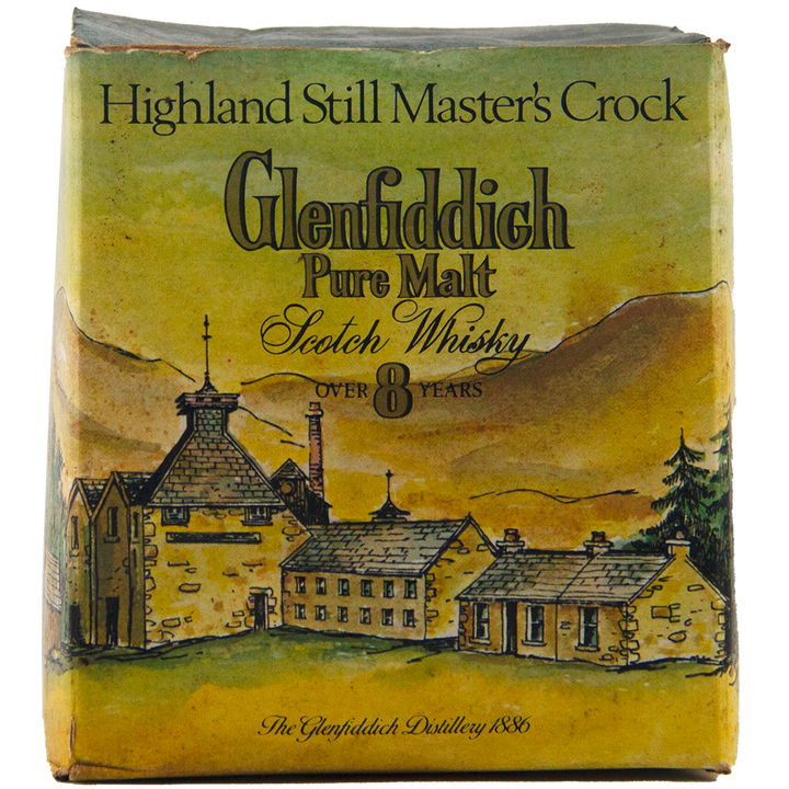 A vintage Glenfiddich 8 Year Old Still Master’s Crock Decanter 1970 Single Malt Scotch Whisky features a distillery scene—ideal for collectors of rare Scotch whisky and unique single malt decanters.