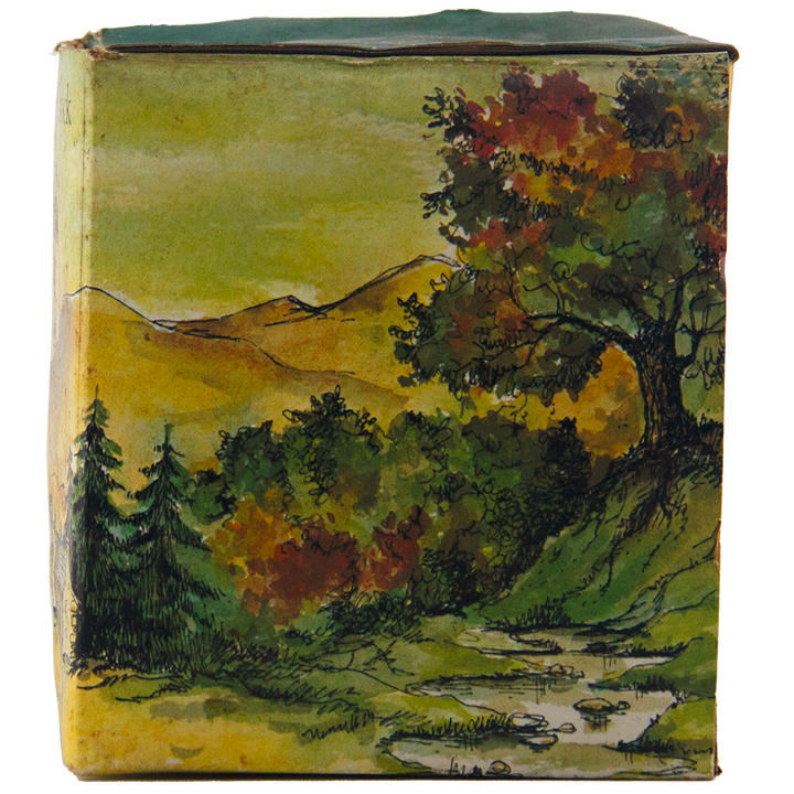The Glenfiddich 8 Year Old Still Master’s Crock Decanter 1970 Single Malt Scotch Whisky comes in a collectible box featuring a painted landscape with a stream, trees in autumn and green leaves, rolling hills, and a yellow-green sky.