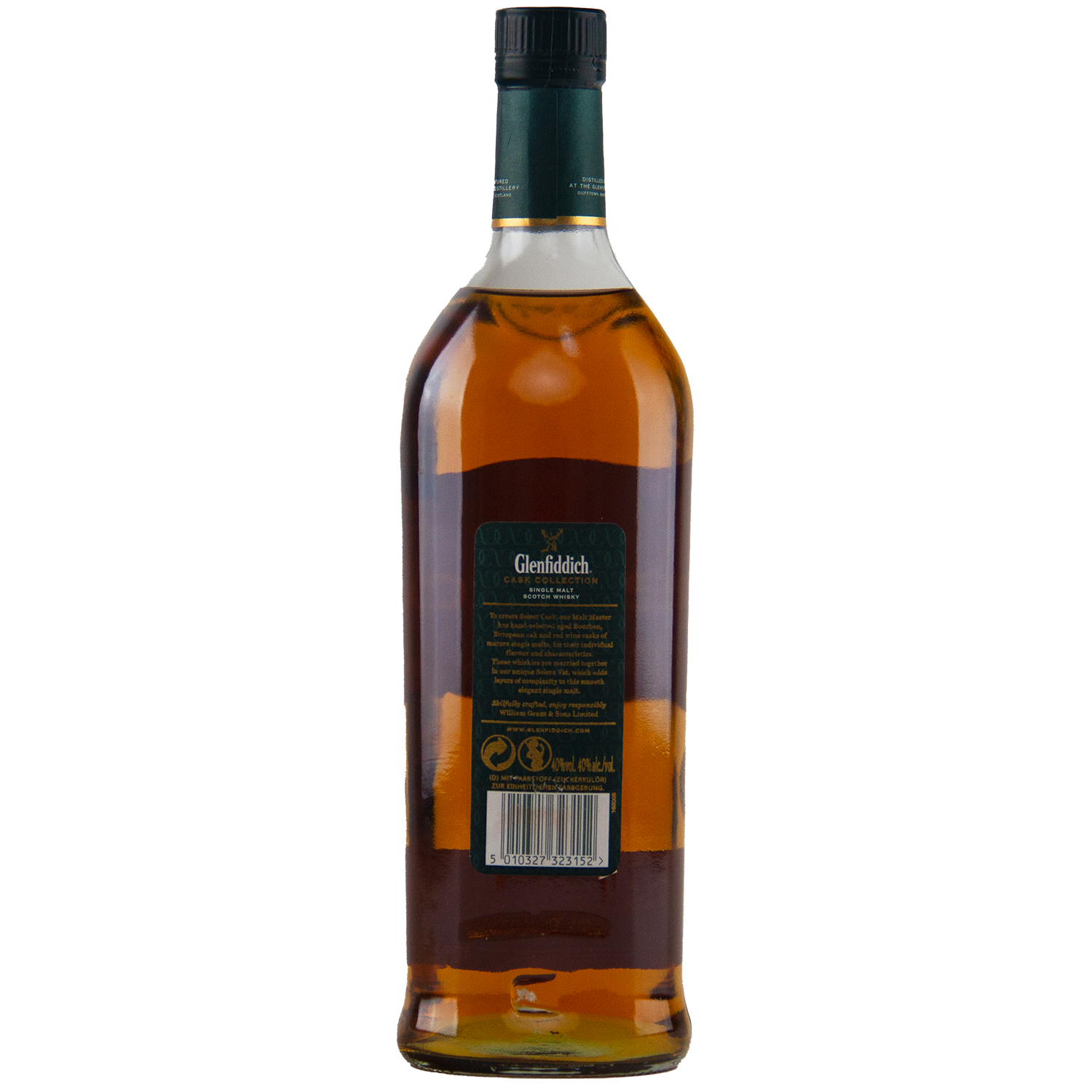A bottle of Glenfiddich Select Cask Single Malt Scotch Whisky is shown from the back, displaying a green label with product details and barcode, sealed with a dark green cap. The amber whisky shines through the clear glass.