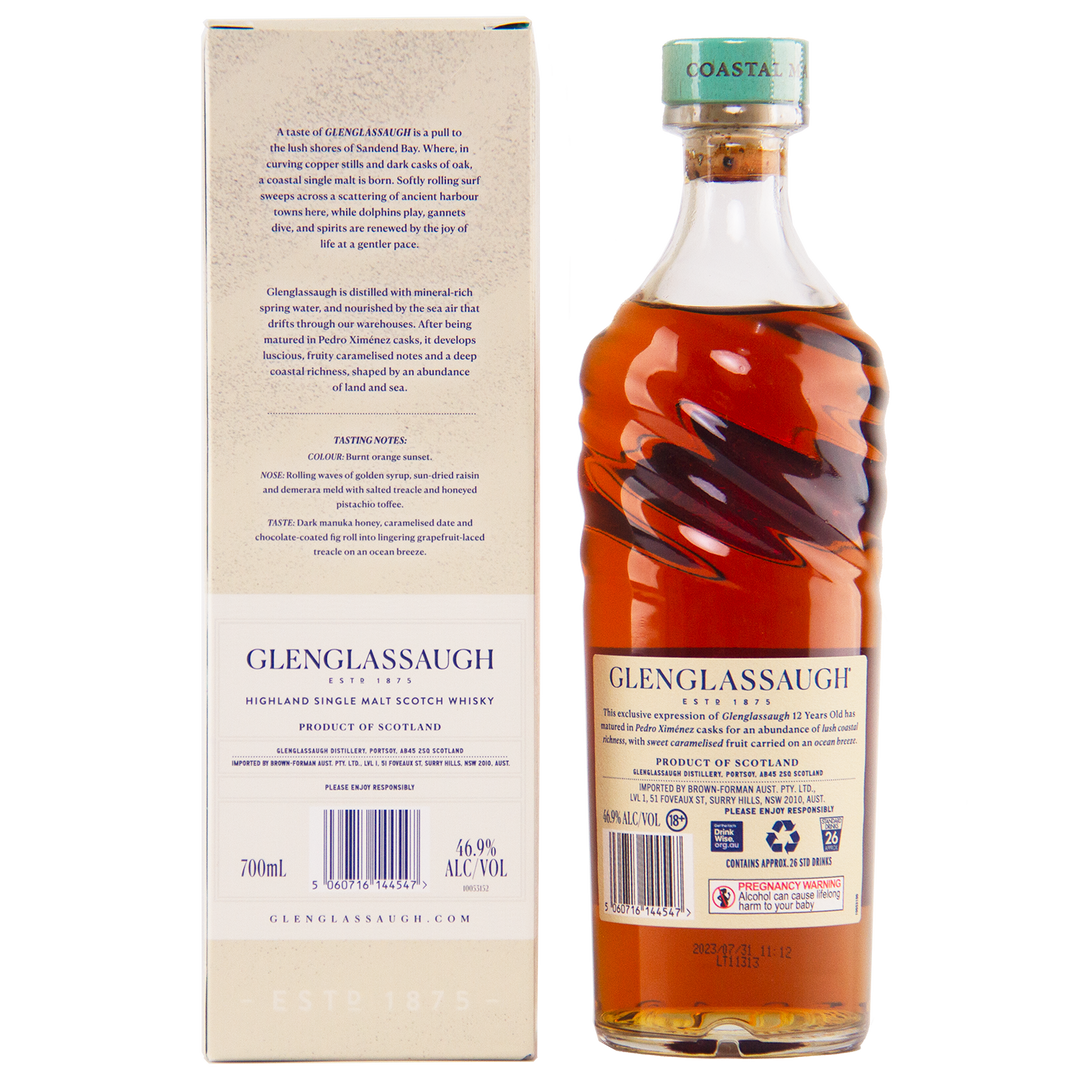 A bottle of Glenglassaugh 12 Year Old Pedro Ximénez Cask Matured Single Malt Scotch Whisky, featuring an amber liquid and green cap, is displayed alongside its beige box with detailed labeling and tasting notes.