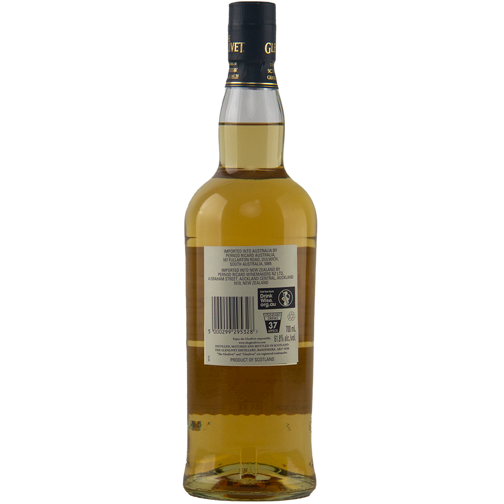 A bottle of Glenlivet Nadurra Peated Cask Finish is shown from the back, featuring a clear label with product details, barcode, and recycling symbols. The non-chill-filtered amber whisky inside has a black and gold cap.