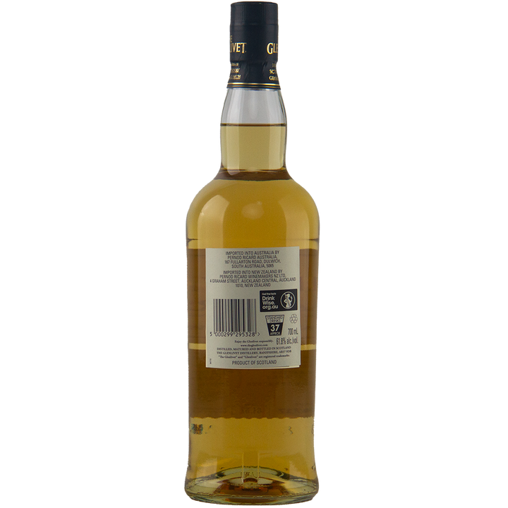 A bottle of Glenlivet Nadurra Peated Cask Finish is shown from the back, featuring a clear label with product details, barcode, and recycling symbols. The non-chill-filtered amber whisky inside has a black and gold cap.