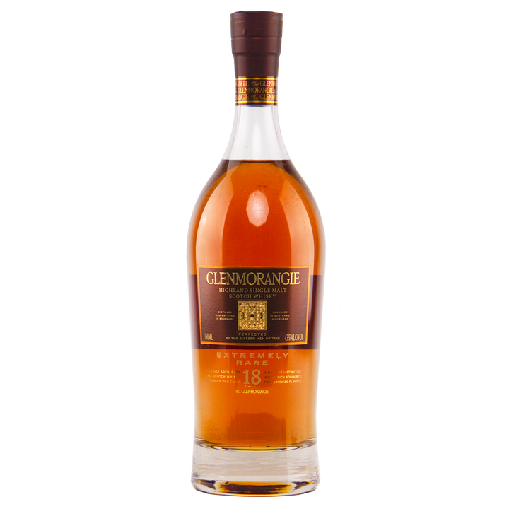 A bottle of Glenmorangie 18 Year Old Extremely Rare (Older Packaging) single malt Scotch whisky, featuring a brown label with gold lettering and amber spirit, is displayed against a white background.