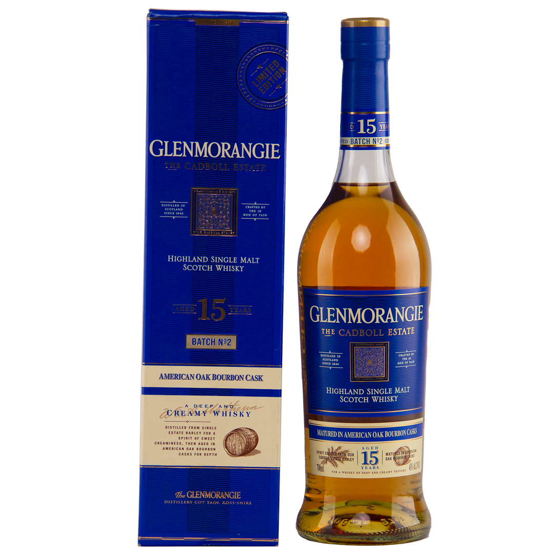 A bottle of Glenmorangie The Cadboll 15 Year Old Single Malt Whisky stands beside its blue and gold box, both displaying distinctive branding and detailed product information.