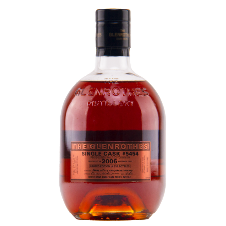 A bottle of Glenrothes #5454 Single Malt Scotch Whisky, featuring dark amber liquid, a black cap, and a copper label. This limited edition matured in a sherry butt offers rich, distinctive character.