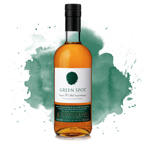 A bottle of Green Spot Single Pot Still Irish Whiskey from Midleton Distillery stands before a green watercolor splash, featuring a green cap and label with a green spot and white text.