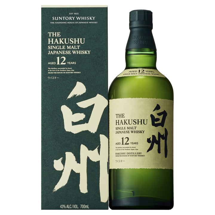 A green bottle of Hakushu 12 Year Old Single Malt Japanese Whisky stands beside its matching dark green box, both displaying white and gold text along with Japanese characters.