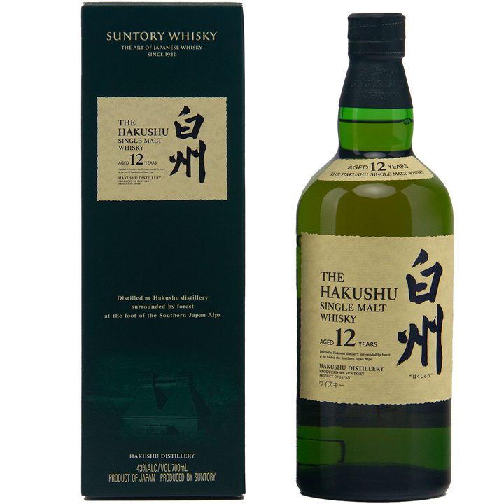 A bottle of Hakushu 12 Year Old (Older Packaging) Single Malt Whisky stands next to its green box, both adorned with gold labels in Japanese and English, highlighting the whisky’s age and origin.