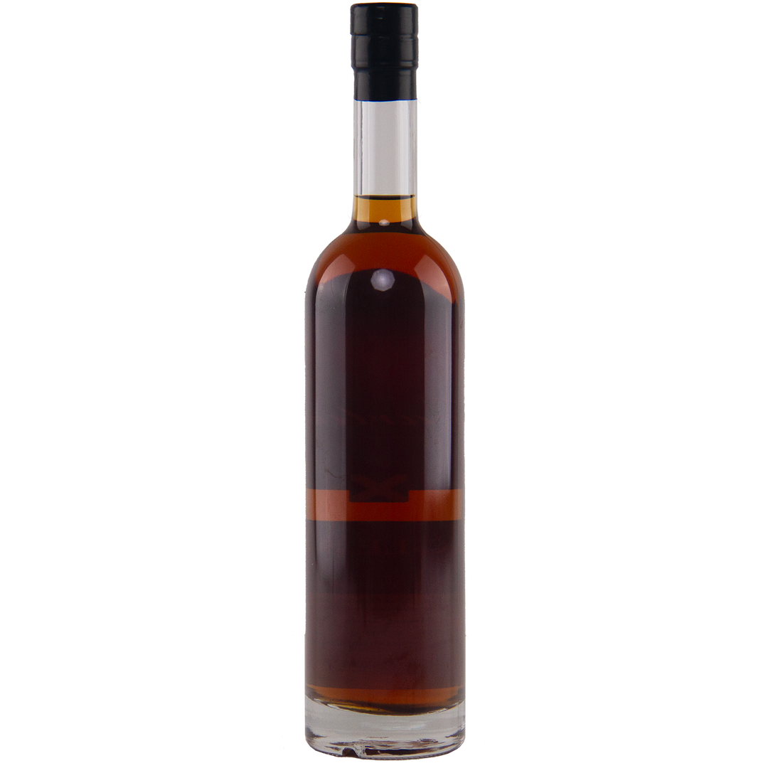 A tall, clear glass bottle of Heartwood The Beagle 8 Australian Single Malt Whisky with dark amber liquid, black cap, and no visible label stands against a plain white background—evoking cask strength exclusivity.