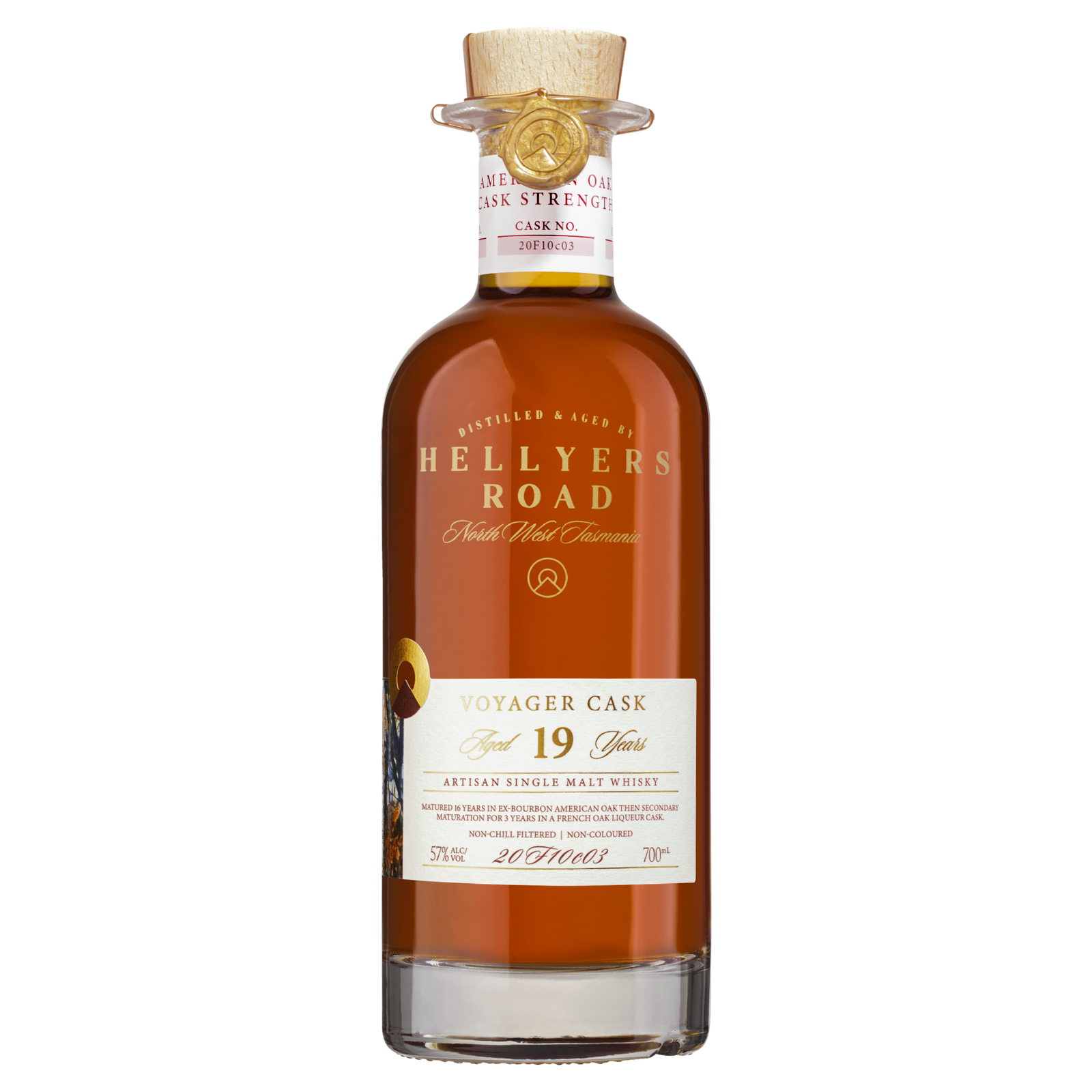 A bottle of Hellyers Road 19 Year Old ‘Voyager Cask’ American & French Oak Australian Single Malt Whisky with amber liquid, gold wax seal, and detailed label on clear glass. A true limited edition collector’s whisky.