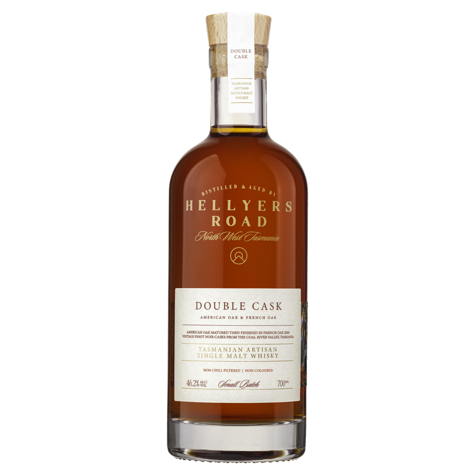 A bottle of Hellyers Road Double Cask Australian Single Malt Whisky features a wooden cork, gold lettering, and a cream label highlighting its double aging in American and French oak, with amber spirit inside for a rich flavor.