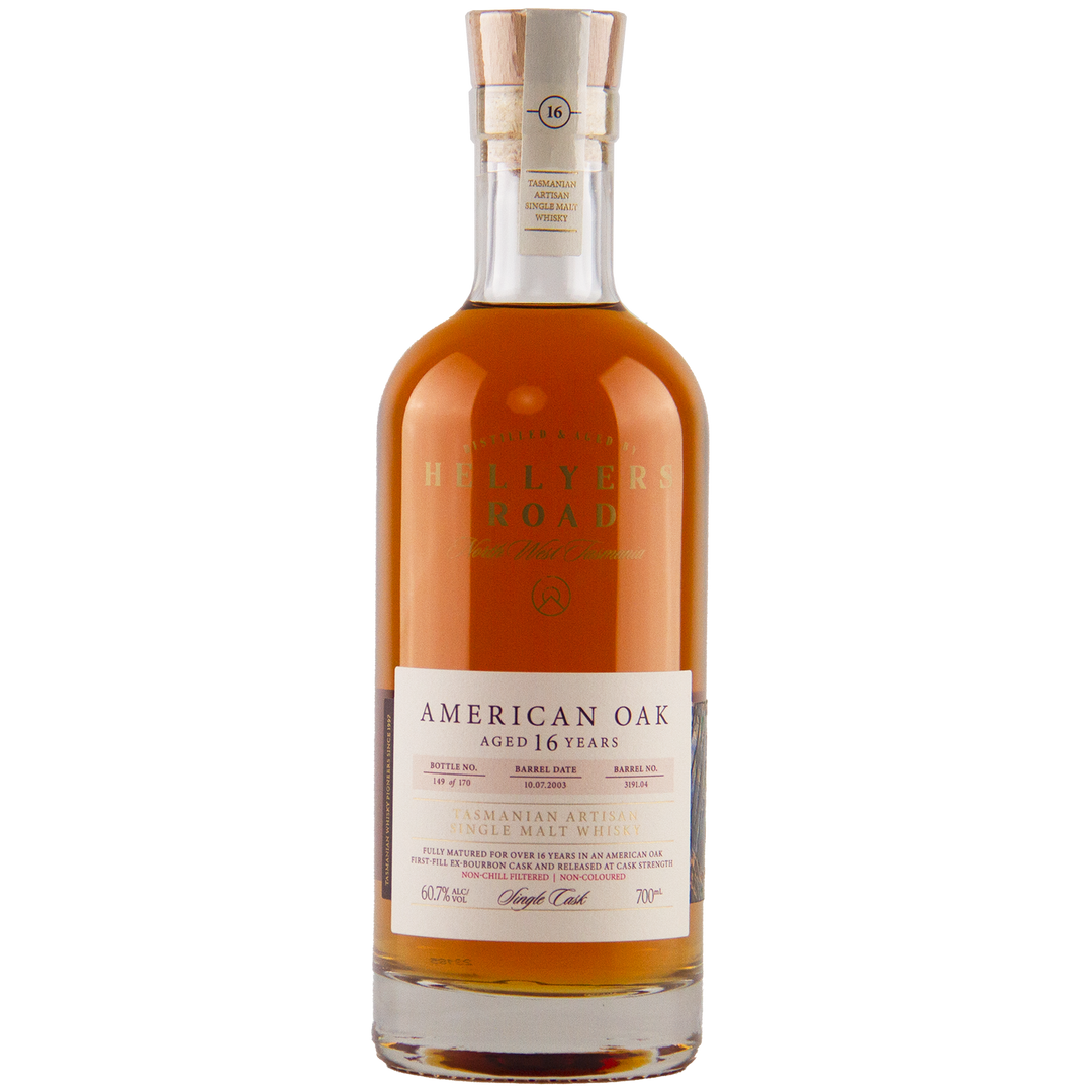 A bottle of Hellyers Road 16 Year Old American Oak Single Cask No. 3191.04 Australian Single Malt Whisky features a cork stopper, copper cap, cream and red label, and holds rich amber-colored spirit aged in American oak.