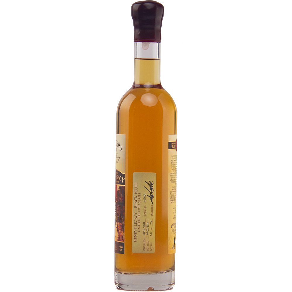 A tall, slender bottle of Hellyers Road Henry's Legacy Series Black Buff Australian Single Malt Whisky, filled with amber liquid and sealed with dark wax. Two labels display text, a signature, an image, and further product details.