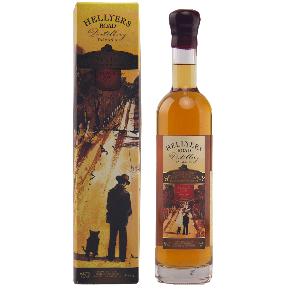 A bottle of Hellyers Road Henry's Legacy Series Black Buff Australian Single Malt Whisky stands beside its box, decorated with artwork of a man and dog walking along a golden path bordered by trees.