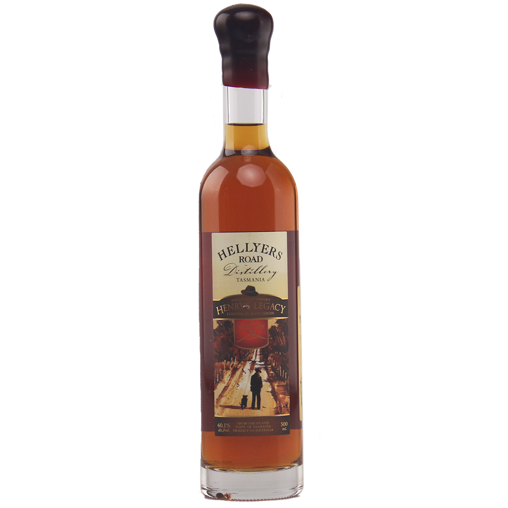 A tall, slender bottle of Hellyers Road Saint Valentines Peak Australian Single Malt Whisky with amber liquid, a maroon wax-sealed cap, and a label displaying the distillery’s name and an illustrated street scene.