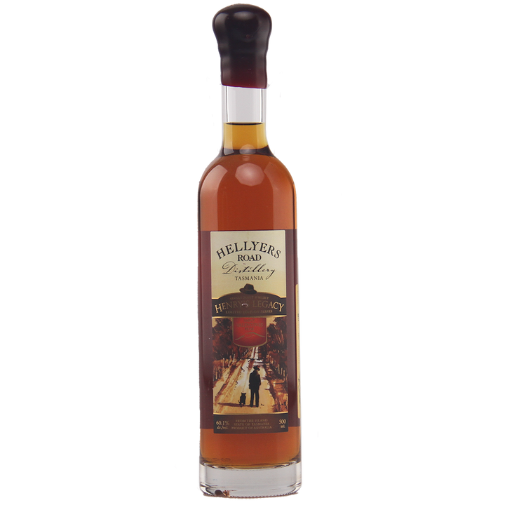 A tall, slender bottle of Hellyers Road Saint Valentines Peak Australian Single Malt Whisky with amber liquid, a maroon wax-sealed cap, and a label displaying the distillery’s name and an illustrated street scene.