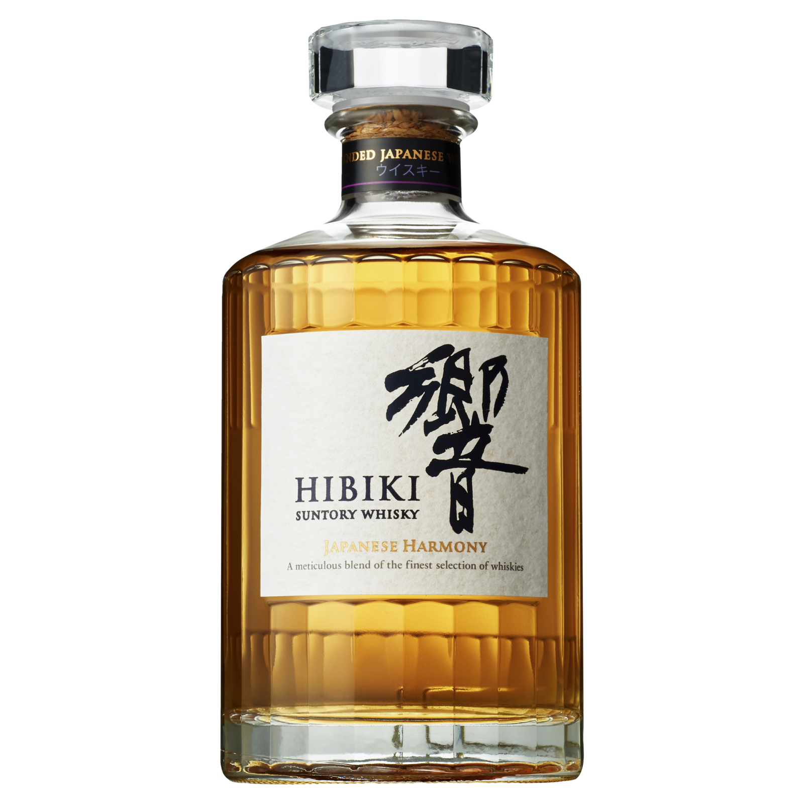 A bottle of Hibiki Japanese Harmony Blended Japanese Whisky features clear, ridged glass, amber liquid, a black and gold label with Japanese characters, and a transparent cap—an elegant showcase of Suntory’s whisky artistry.