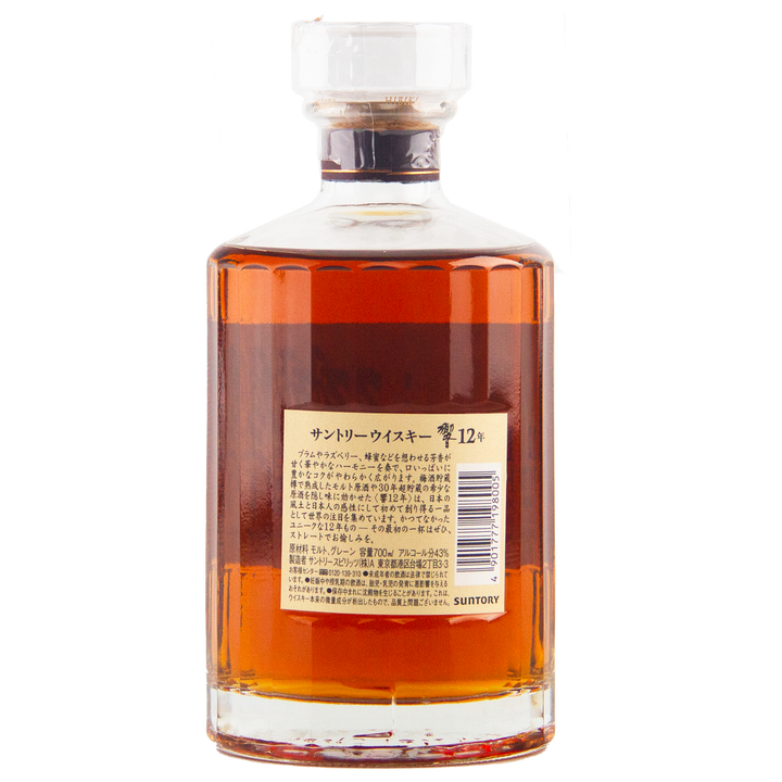 A bottle of Hibiki 12 Year Old Japanese Blended Whisky featuring amber liquid, a clear cap, and a beige label with Japanese text and a barcode, showcasing Suntory’s renowned 12-year-old release.