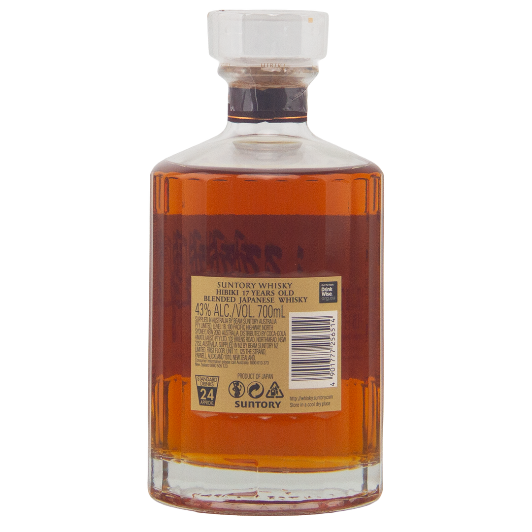 A bottle of Hibiki 17 Year Old Japanese Blended Malt Whisky with amber liquid, a beige label, 43% alcohol by volume, 700ml capacity, and crafted with hints of Mizunara oak.