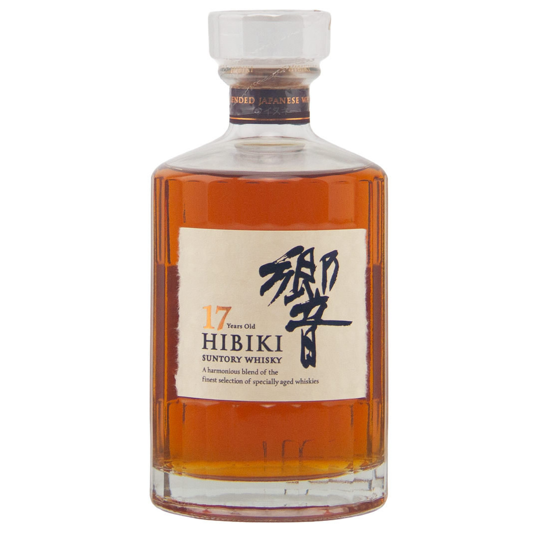 A bottle of Hibiki 17 Year Old Japanese Blended Malt Whisky in a clear glass decanter with stopper, white label with Japanese characters and details, and amber liquid crafted with rare Mizunara oak influence.