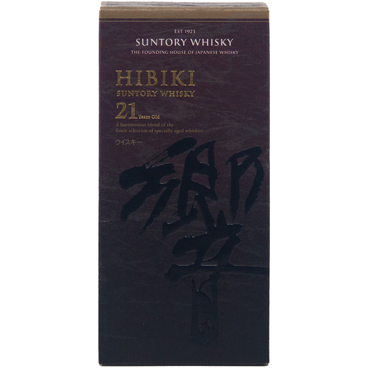 A box of Hibiki 21 Year Old Japanese Blended Malt Whisky, adorned with gold and white text on a dark background with Japanese characters, showcases elegant branding and the influence of Mizunara oak.