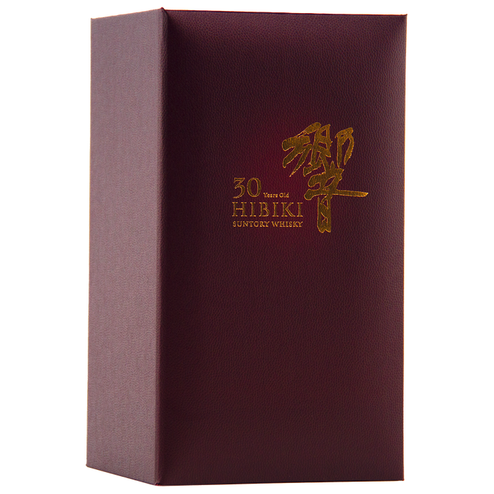 A maroon box with gold Japanese characters and “Hibiki 30 Year Old Japanese Blended Malt Whisky” on the front, its upright shape and clean edges highlighting the elegance of this prized release.