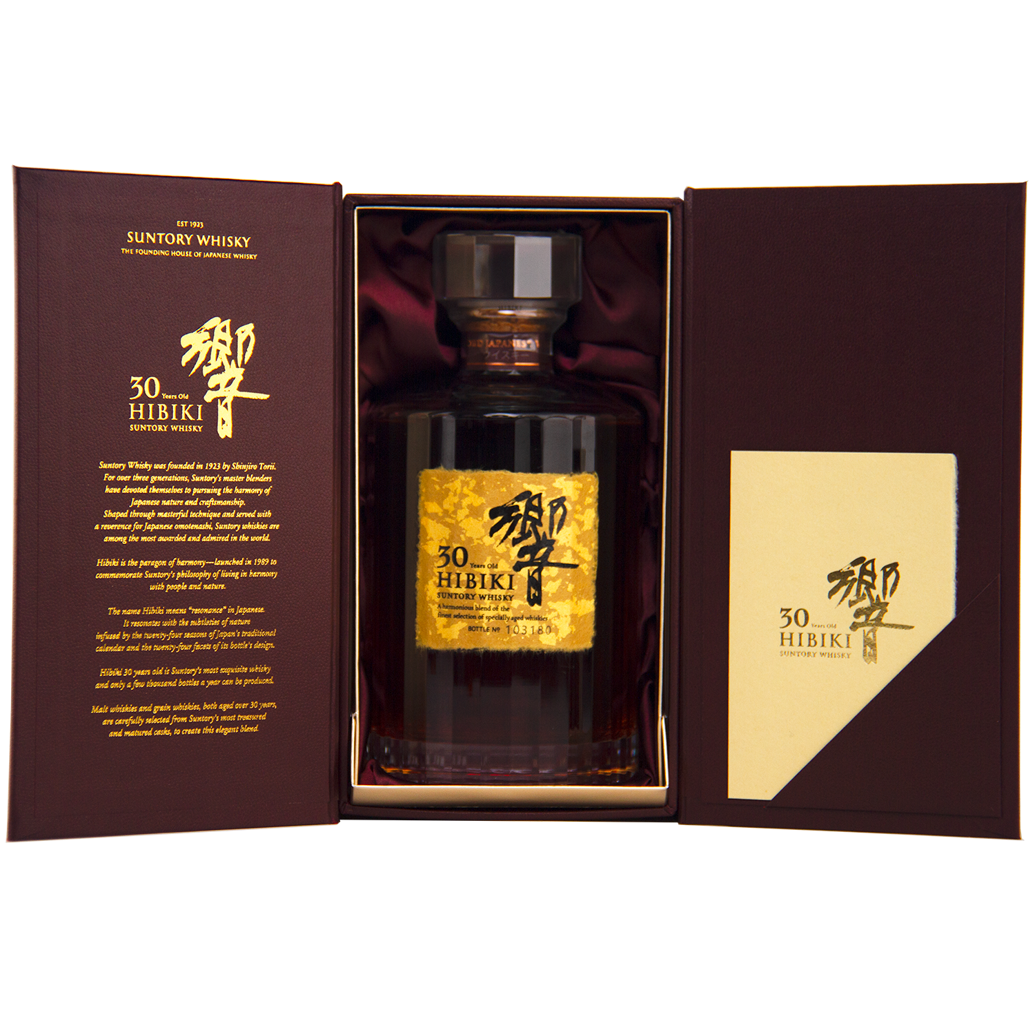 A bottle of Hibiki 30 Year Old Japanese Blended Malt Whisky in an open brown box with gold Japanese writing and an info card on the right. The label displays gold foil and elegant Japanese characters.