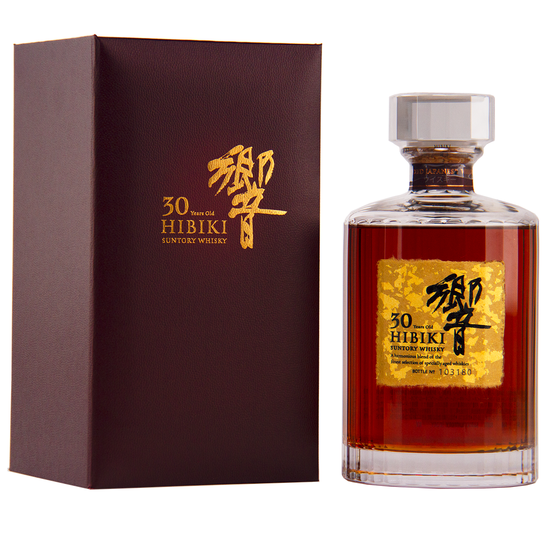 A bottle of Hibiki 30 Year Old Japanese Blended Malt Whisky with a gold-accented label stands beside its matching burgundy gift box with gold lettering on a white background.