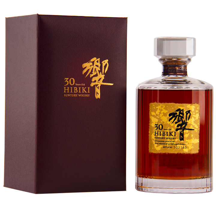 A bottle of Hibiki 30 Year Old Japanese Blended Malt Whisky with a gold-accented label stands beside its matching burgundy gift box with gold lettering on a white background.