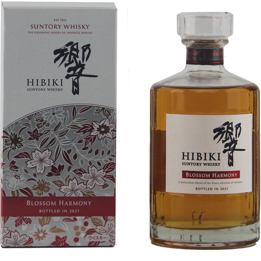 A bottle of Hibiki Blossom Harmony 2021 Japanese Blended Malt Whisky stands next to its floral-patterned box with Japanese text. This limited edition whisky was bottled in 2021.