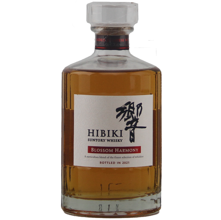 A bottle of Hibiki Blossom Harmony 2021 Japanese Blended Malt Whisky, a limited-edition release from 2021, presented in a clear glass bottle with amber liquid and a white label featuring black and red text.