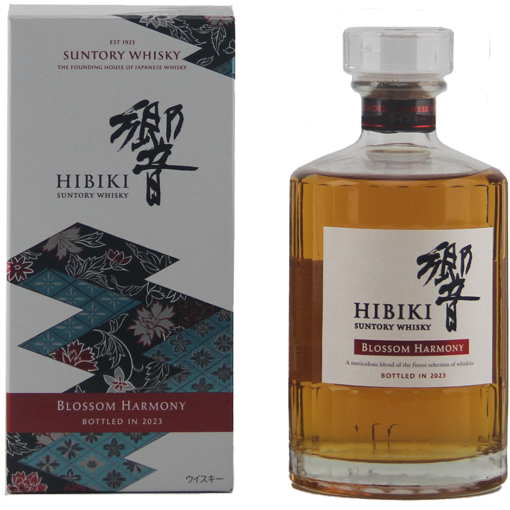 A bottle of Hibiki Blossom Harmony 2023 Japanese Blended Malt Whisky stands next to its floral-patterned box adorned with Japanese text.