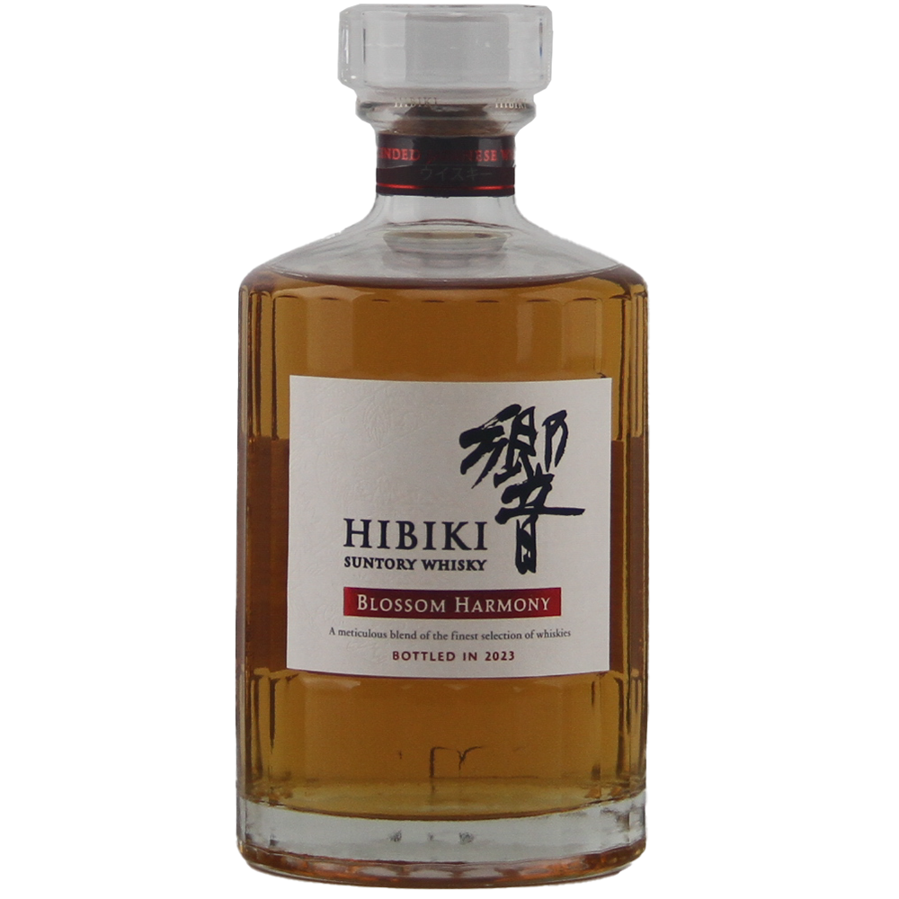 A bottle of Hibiki Blossom Harmony 2023 Japanese Blended Malt Whisky, limited edition, in clear glass with a white label featuring black and red text plus Japanese characters, highlights its amber whisky inside.