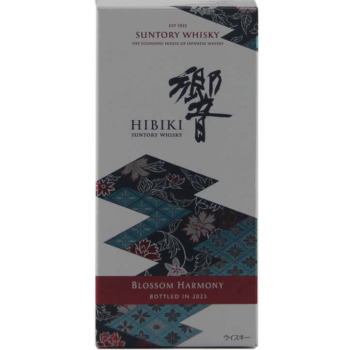 A box of Hibiki Blossom Harmony 2023 Japanese Blended Malt Whisky, a limited edition with a floral pattern in blue, red, and gold, bottled in 2023.