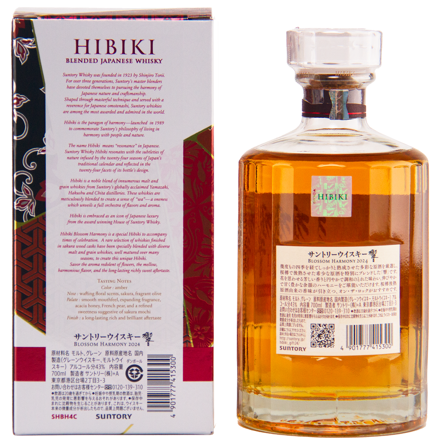 A bottle of Hibiki Blossom Harmony 2024 Limited Edition whisky beside its box. The clear bottle has a patterned label and stopper; the box showcases tasting notes and sakura cask details in English and Japanese.