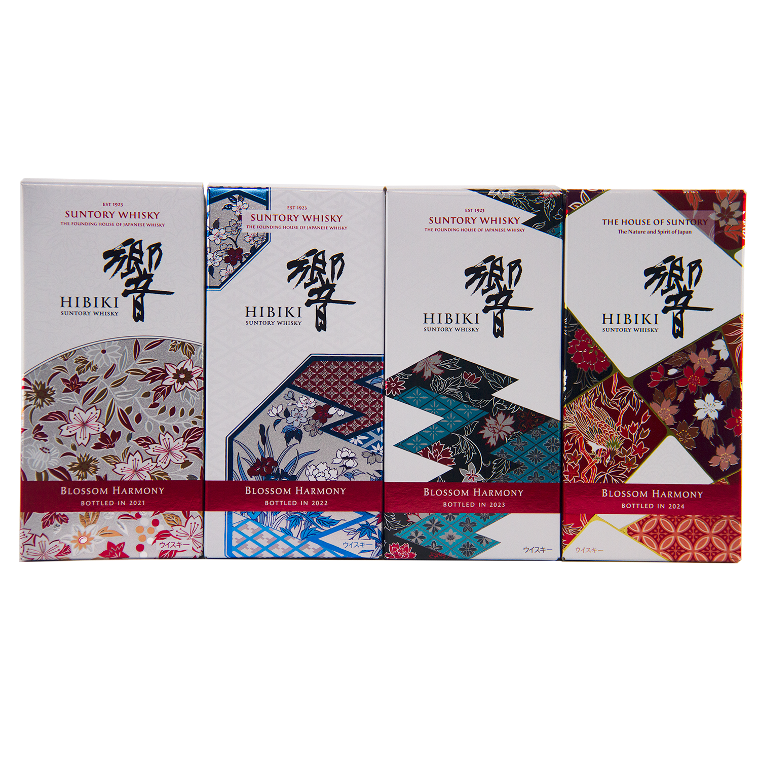 The Hibiki Blossom Harmony Limited Edition Collection 2021 to 2024 features four decorative boxes, each with distinct floral and geometric Japanese designs in red, blue, teal, and gold accents, displayed side by side.
