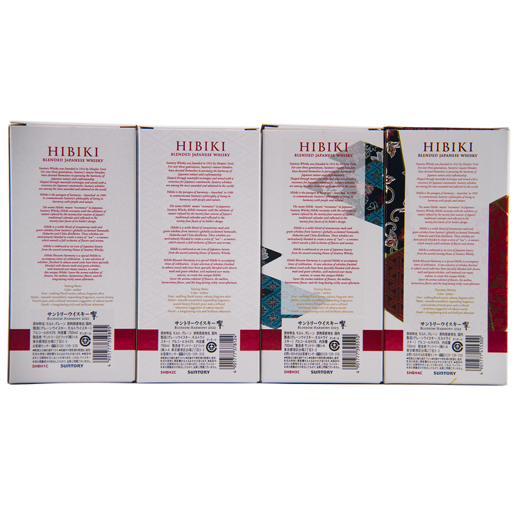 Four boxes of Hibiki Blossom Harmony Limited Edition Collection 2021 to 2024 are displayed side by side, showing their back panels with red and black text, barcodes, and Japanese motifs—a striking Suntory limited edition set.