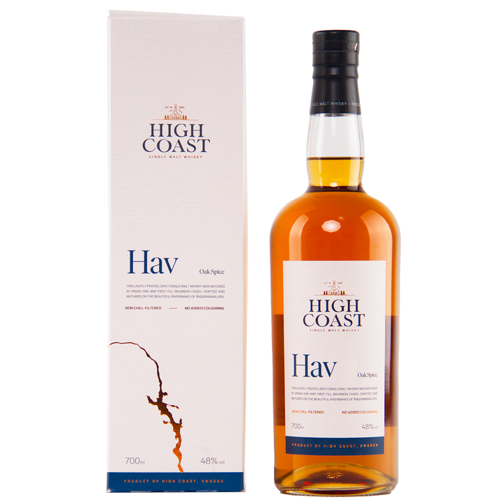 A bottle of High Coast Hav Single Malt Swedish Whisky stands beside its white box, both adorned with blue and gold text and a map outline. The bottle holds amber whisky matured in oak casks.