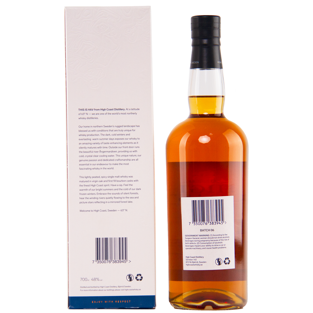 A bottle of High Coast Hav Single Malt Swedish Whisky with a black cap stands next to its white box. Both show barcode labels and product info on the back, while the box highlights its unique oak cask maturation.