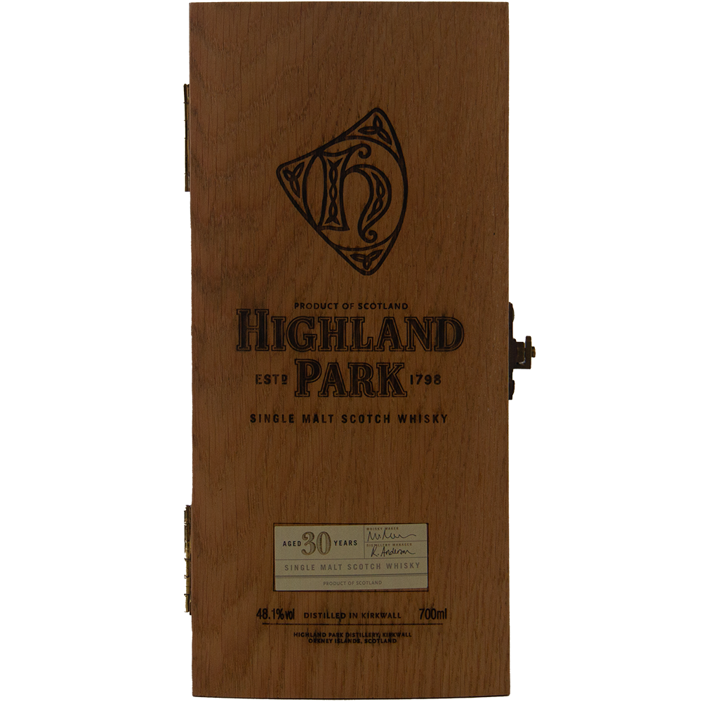 A wooden box engraved with "Highland Park 30 Year Old Single Malt Whisky"—a collector’s item featuring the logo and distillery details.