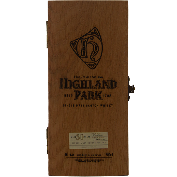 A wooden box engraved with "Highland Park 30 Year Old Single Malt Whisky"—a collector’s item featuring the logo and distillery details.