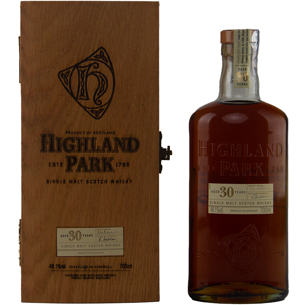 A bottle of Highland Park 30 Year Old Single Malt Whisky stands next to its wooden box, both featuring engraved and printed details—an exceptional collector’s item for whisky enthusiasts.