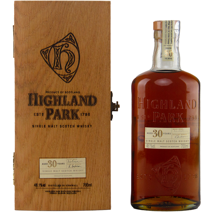 Highland Park 30-year-old single malt Scotch whisky bottle and wooden box on a white background